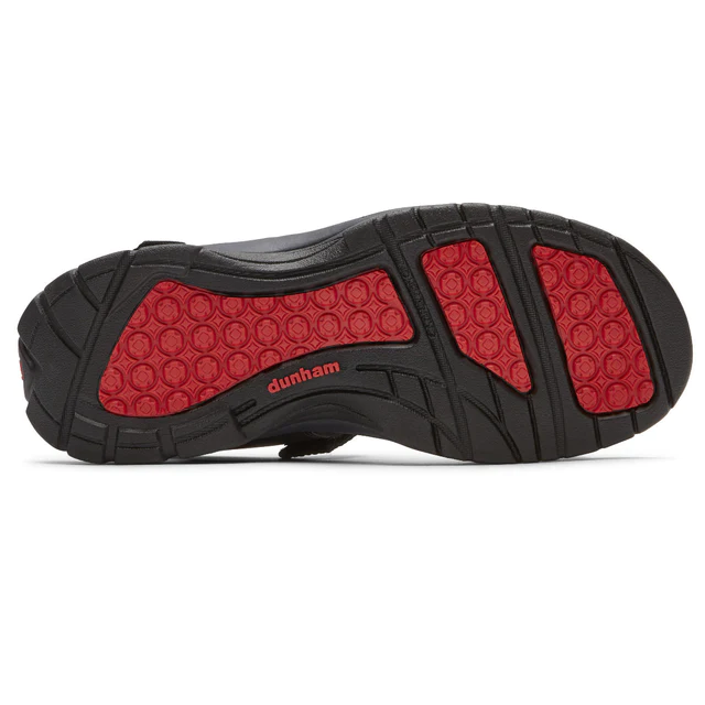 Dunham Nolan Water Friendly Sandal outsole with durable black rubber and textured red traction inserts, sole/bottom view.