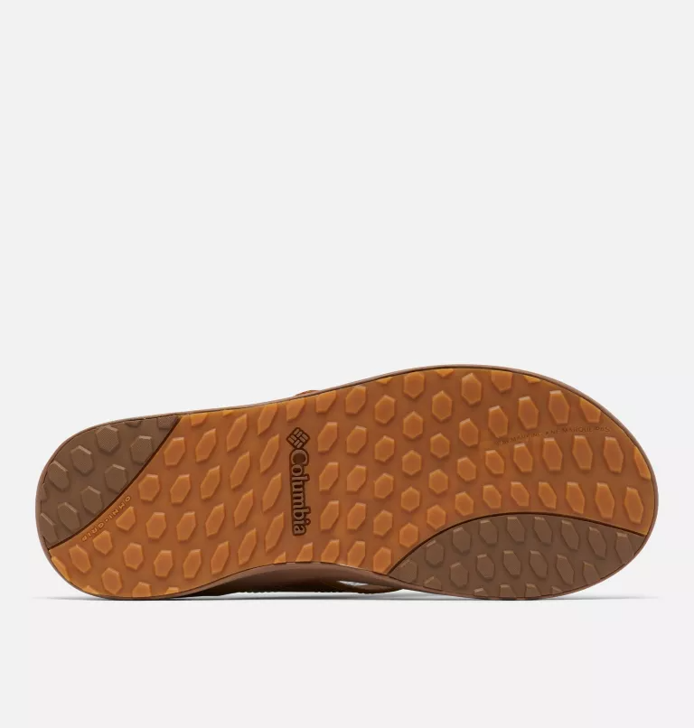 Columbia PFG Rostra™ Beachcomber™ LE shoe outsole in brown rubber with textured grip pattern and brand logo, sole/bottom view.