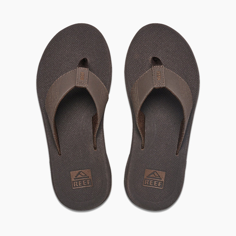 Reef Phantom II flip-flops in dark brown with textured footbeds and synthetic straps, top view.