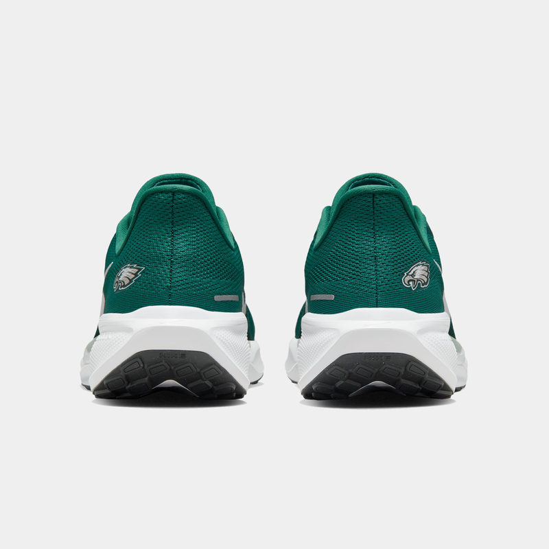 Nike Philadelphia Eagles Pegasus 41 running shoes back view showing green mesh upper, Eagles logo, and white midsole with black outsole.