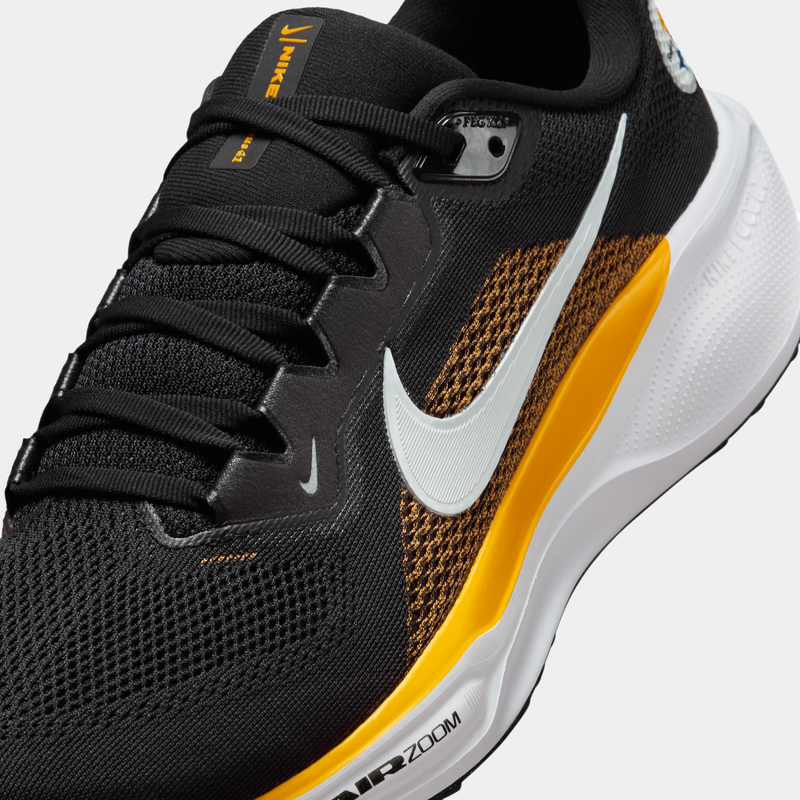Nike Pittsburgh Steelers Pegasus 41 running shoes with black mesh upper, gold accents, white Nike Swoosh, and Zoom Air cushioning, close-up side view.