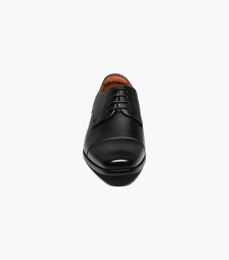 Florsheim Postino Cap Toe Oxford dress shoe in black leather with cap toe detail and closed lacing, front view.