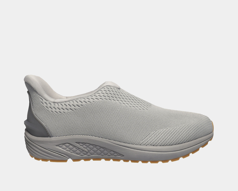 Propét One Velocity Slip-On shoes in light gray with breathable mesh upper and textured sole, side view.