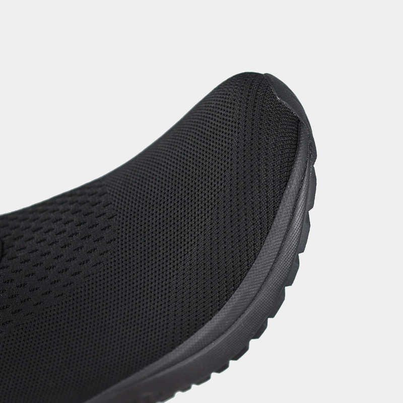 Propét One Velocity Slip-On shoe in black with breathable mesh upper and sleek toe design, close-up toe view.