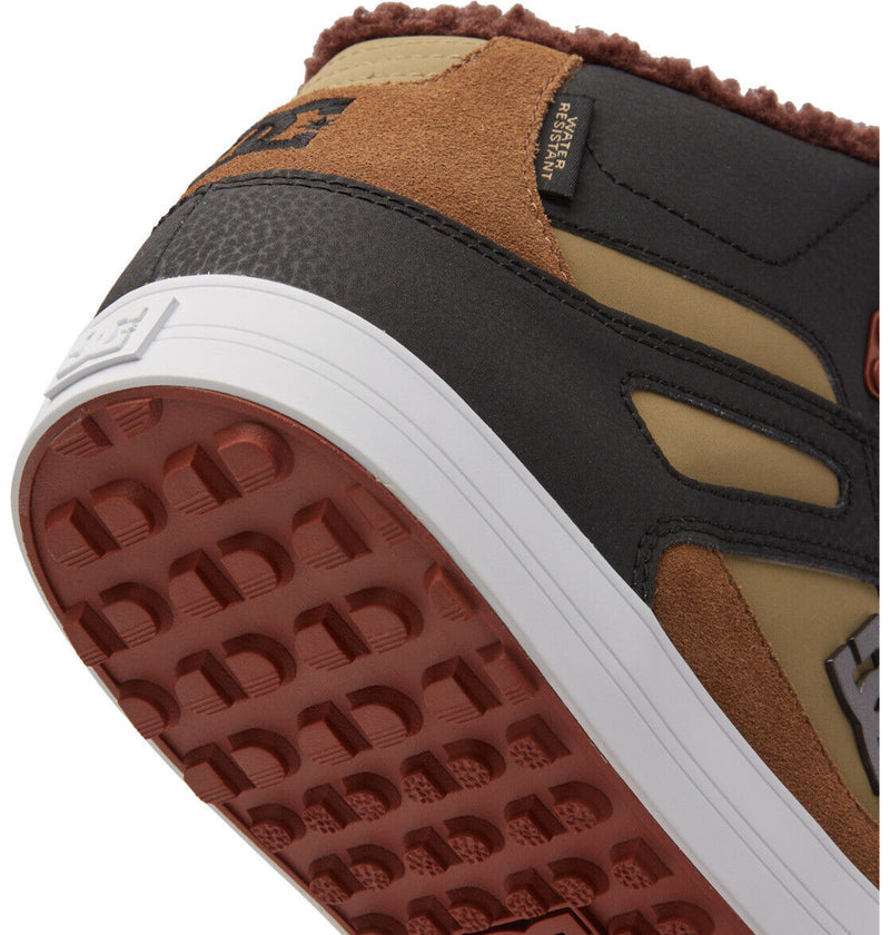 DC Footwear Pure High Top WC Winter shoes with water-resistant materials, suede and leather overlays, and durable red rubber outsole, heel view.