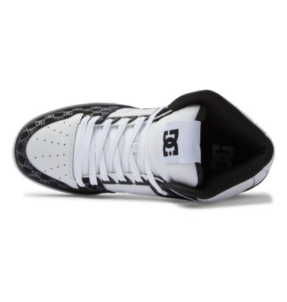 DC Footwear Pure High Top WC sneakers top view showing white perforated toe box, black patterned details, and lace system.