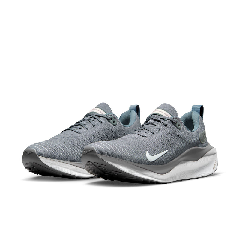 Nike React Infinity Run 4 running shoes in gray with breathable mesh upper, white midsole, and black outsole, front angle view.