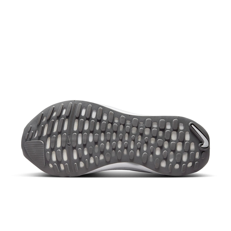 Nike React Infinity Run 4 running shoes outsole featuring textured rubber tread in gray for enhanced grip and durability.