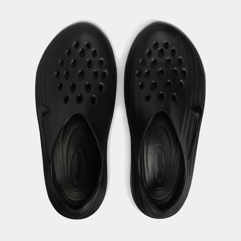 Nike ReactX Rejuven8 slip-on shoes in black with perforated upper for breathability and ergonomic footbed, top view.