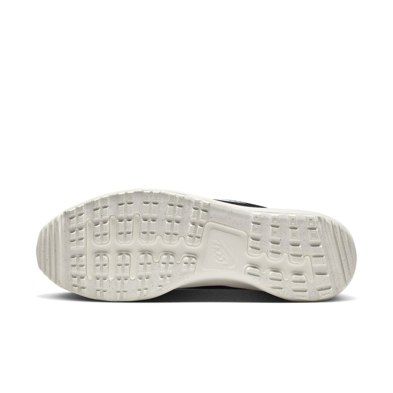 Nike Roshe Golf Next Nature golf shoe outsole in white with traction pattern and Nike logo detailing, sole/bottom view.