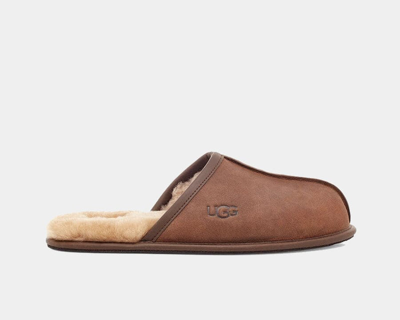 UGG Scuff Leather Slipper in chestnut brown with suede upper, soft shearling lining, and embossed logo, side view.