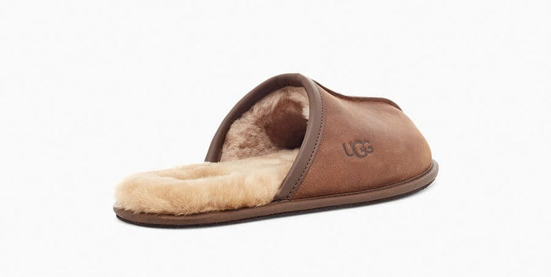 UGG Scuff Leather Slipper in chestnut brown with premium leather upper and plush shearling lining, side angle view.