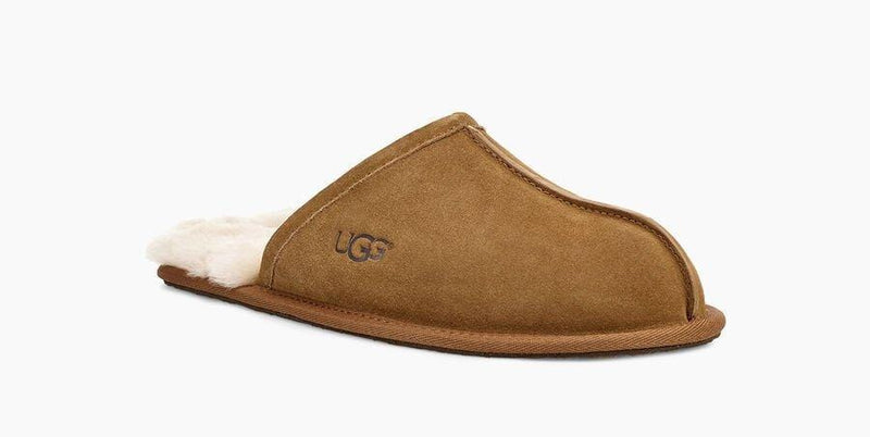 UGG Scuff slippers in chestnut brown suede with plush white shearling lining and low-profile sole, side view.