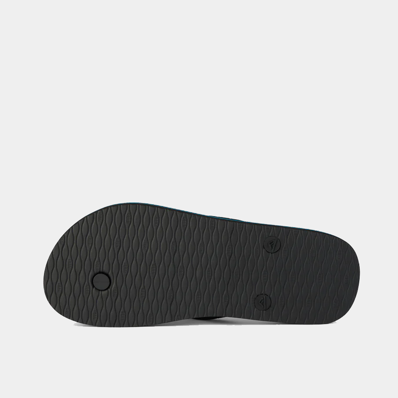Reef Seaside flip-flops black rubber sole with textured grip, bottom view.