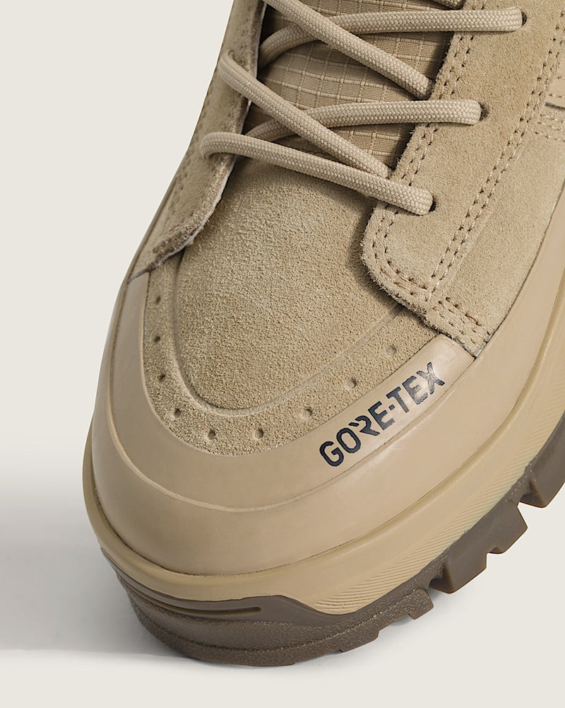 Vans Sk8-Hi GORE-TEX Insulated Shoe in beige with rugged suede upper, GORE-TEX branding, and durable traction sole, close-up of toe box.