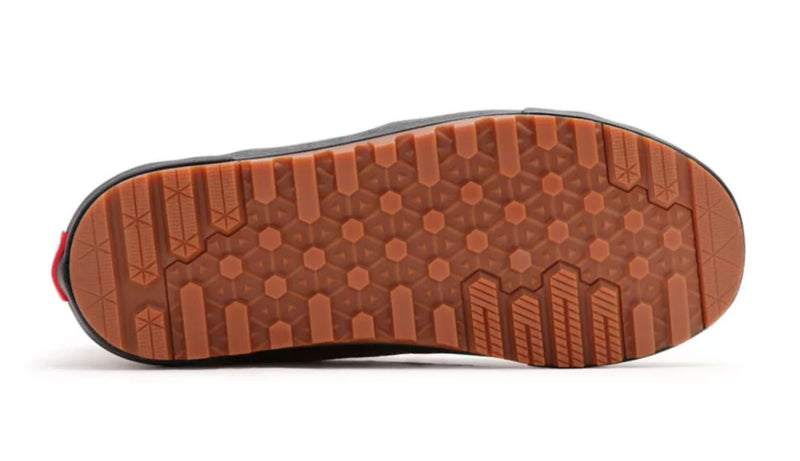 Vans Sk8-Hi MTE-2 shoe outsole in brown rubber featuring deep traction pattern and hexagonal grip design, sole/bottom view.