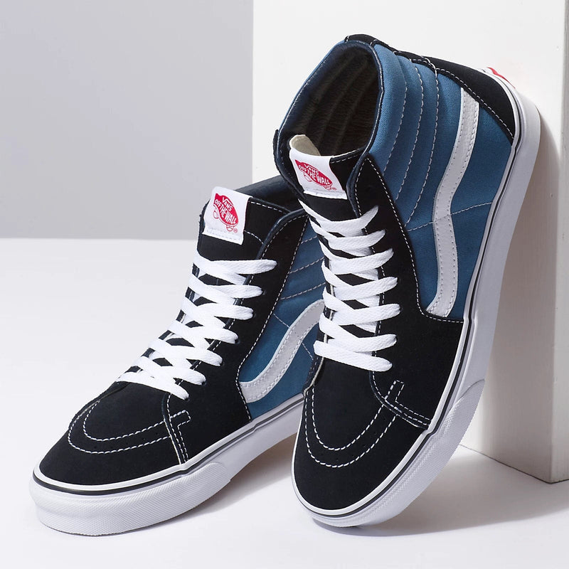 Vans Sk8-Hi high-top sneakers in black and blue with white laces, signature side stripe, and padded collar, angled front view.