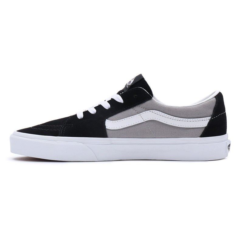 Vans Sk8-Low sneakers side view in black and gray canvas with white suede accents and signature white side stripe.
