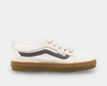 Vans Skate Chukka Low Sidestripe sneakers in off-white suede with black sidestripe and gum rubber sole, side view.