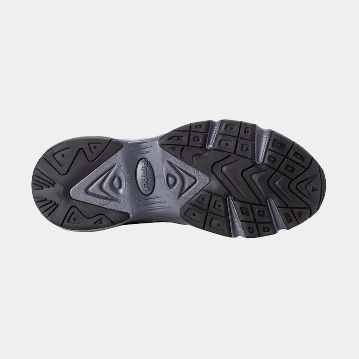 Propet Stability Walker shoe outsole in black and gray with durable tread design for enhanced traction, bottom view.