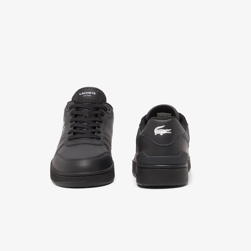 Lacoste T-Clip Set 224 2 SMA sneakers in black with a leather upper, lace-up design, and white crocodile logo, front and back view.