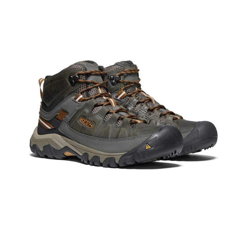 Keen Targhee III Waterproof Mid hiking boots in olive green and black with rugged rubber outsole and waterproof leather upper, front angled view.
