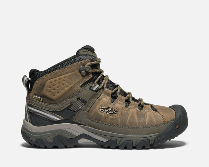 Keen Targhee III Waterproof Mid hiking boots in brown leather and mesh with rugged rubber outsole, side view.