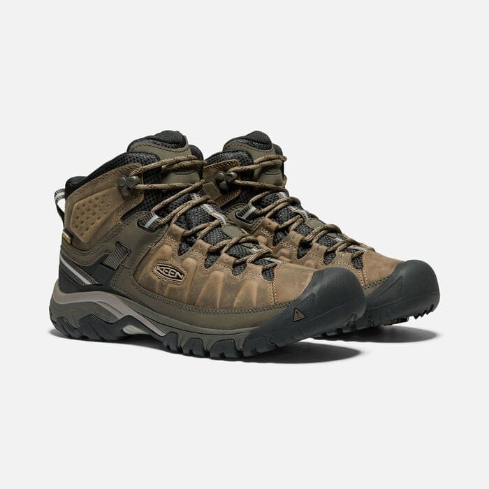 Keen Targhee III Waterproof Mid hiking boots in brown leather with durable rubber outsole and lace-up design, front-side view.
