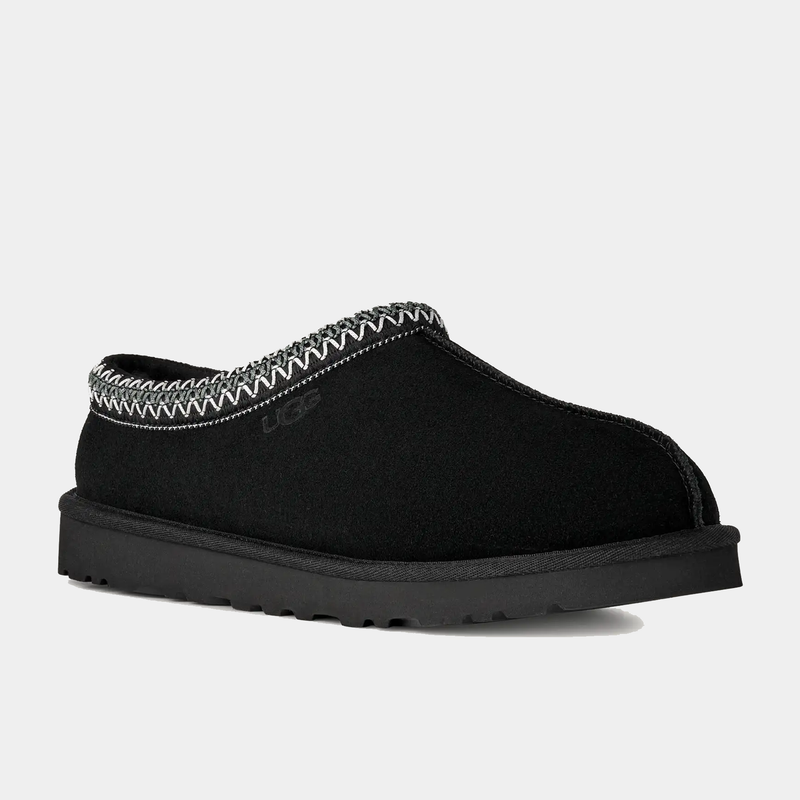 UGG Tasman II Slipper in black with embroidered trim detail, suede upper, and durable Treadlite sole, side view.