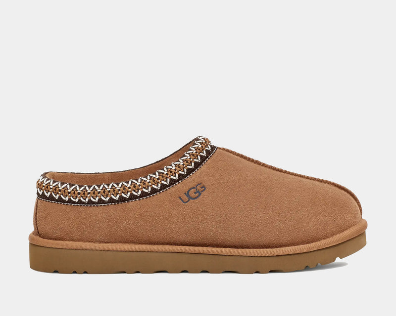 UGG Tasman Slipper in chestnut brown suede with an embroidered collar design and durable treaded sole, side view.