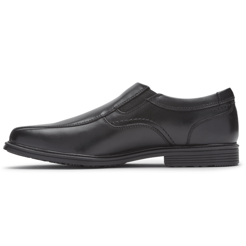 Rockport Taylor Slip On dress shoes in black leather with sleek stitching and padded sole, side view.