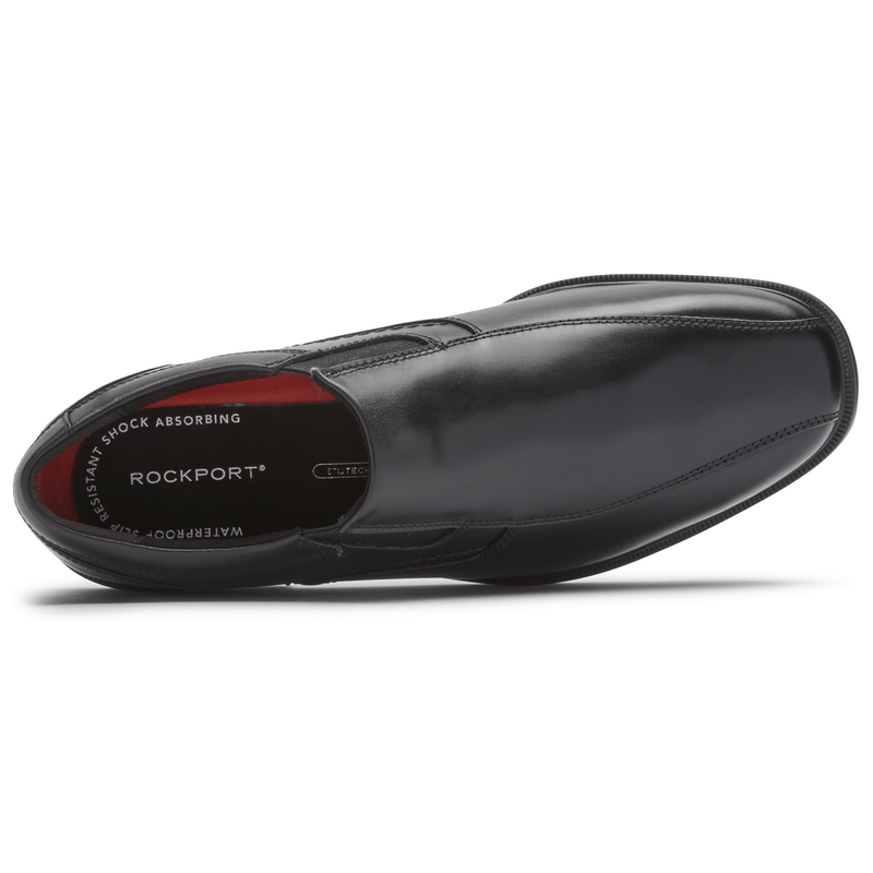 Rockport Taylor Slip On shoes in black leather with stitched detailing and cushioned footbed, top view showing interior design.