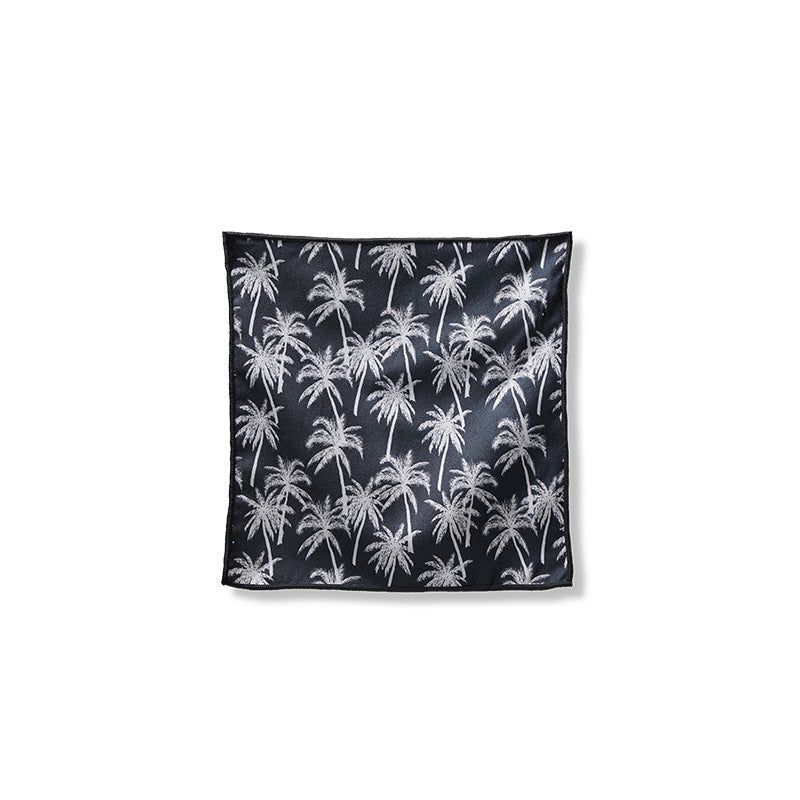 Nomadix Tiny Towel 3-Pack, compact microfiber towel with black and white palm tree pattern, front view.