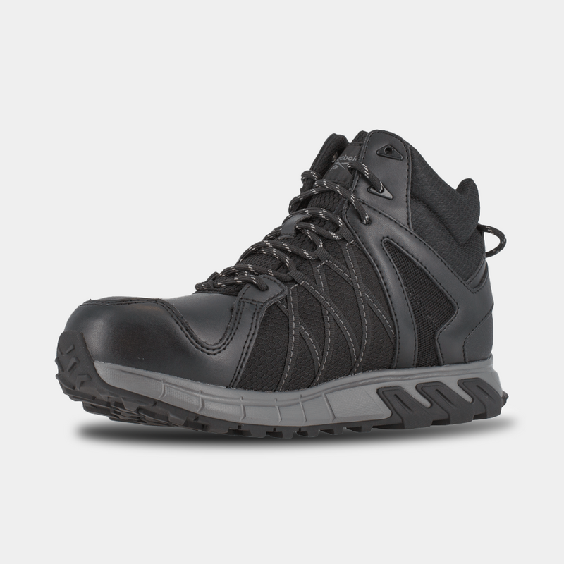 Reebok Work Trailgrip Work boots in black with durable leather upper and mesh panels, reinforced toe, and rugged outsole, side view.