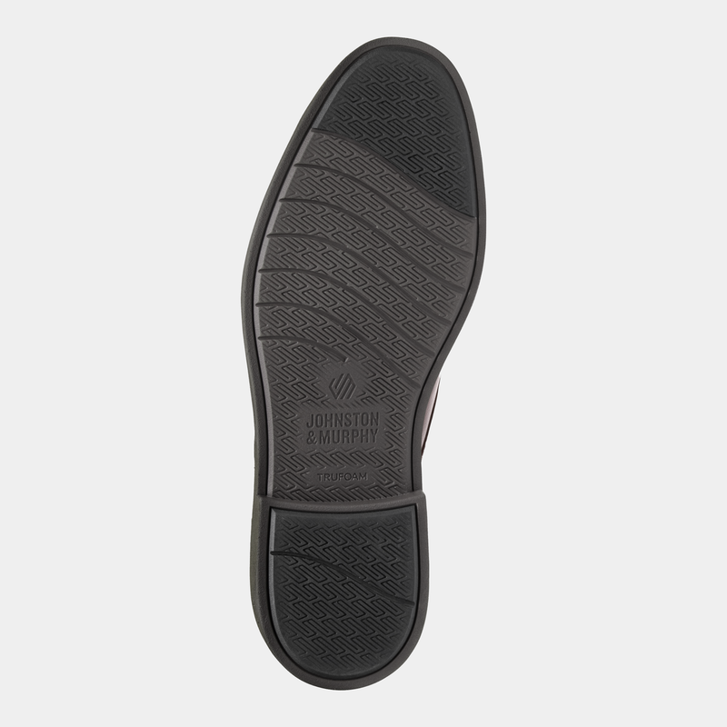 Johnston & Murphy Tyson Plain Toe shoe outsole showing black TruFoam sole with textured tread pattern and logo details.