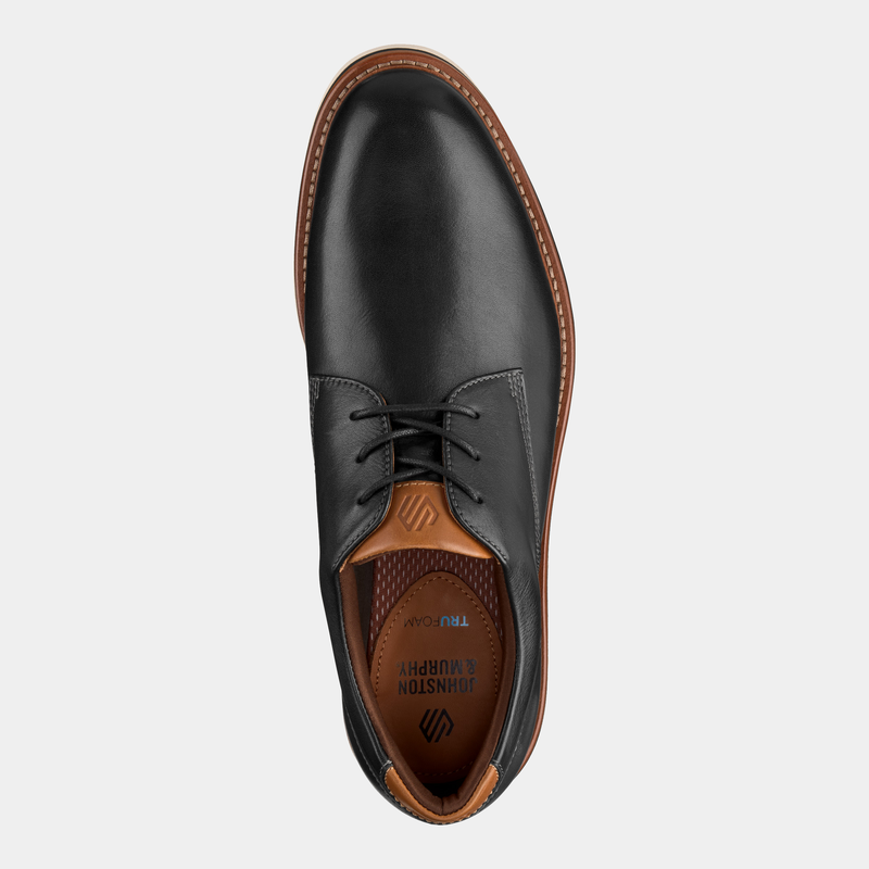 Johnston & Murphy Tyson Plain Toe shoes in black leather with tan accents and cushioned insole, top view.