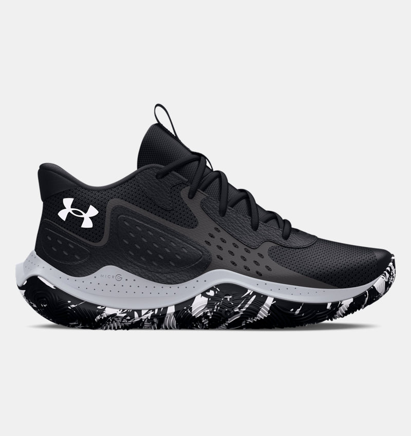 Under Armour UA Jet '23 basketball shoes in black with perforated mesh upper, gray midsole, and black-and-white patterned outsole, side view.