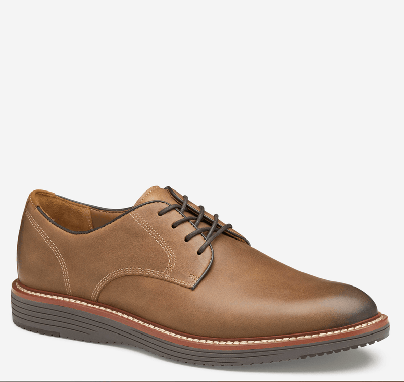 Johnston & Murphy Upton Plain Toe shoes in tan leather with stitched detailing, lace-up design, and textured outsole, side view.