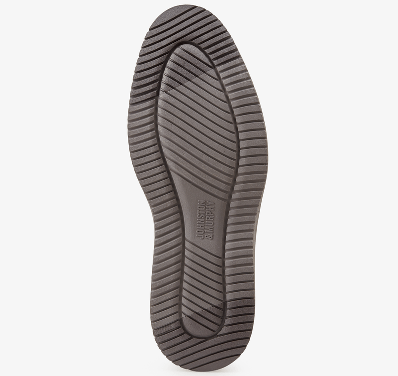 Johnston & Murphy Upton Plain Toe shoe outsole in dark brown rubber with textured grip pattern and branded detailing.