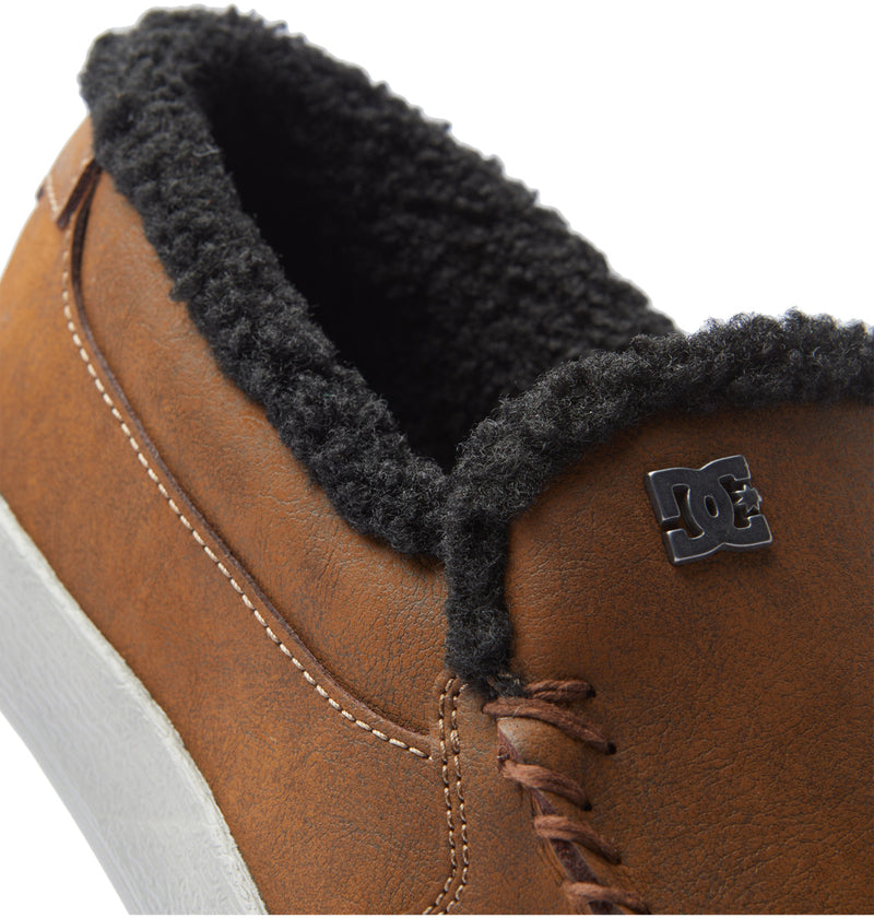 DC Footwear Villain 2 SE slip-on shoes in brown with black fleece lining, stitched details, and logo accent, side view.