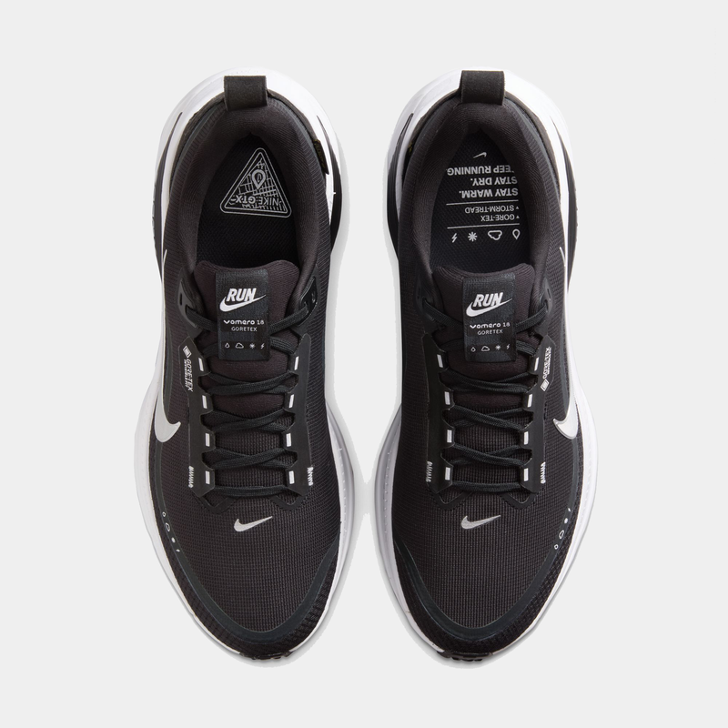 Nike Vomero 18 GORE-TEX running shoes in black with waterproof GORE-TEX upper, white accents, and reinforced lace system, top view.