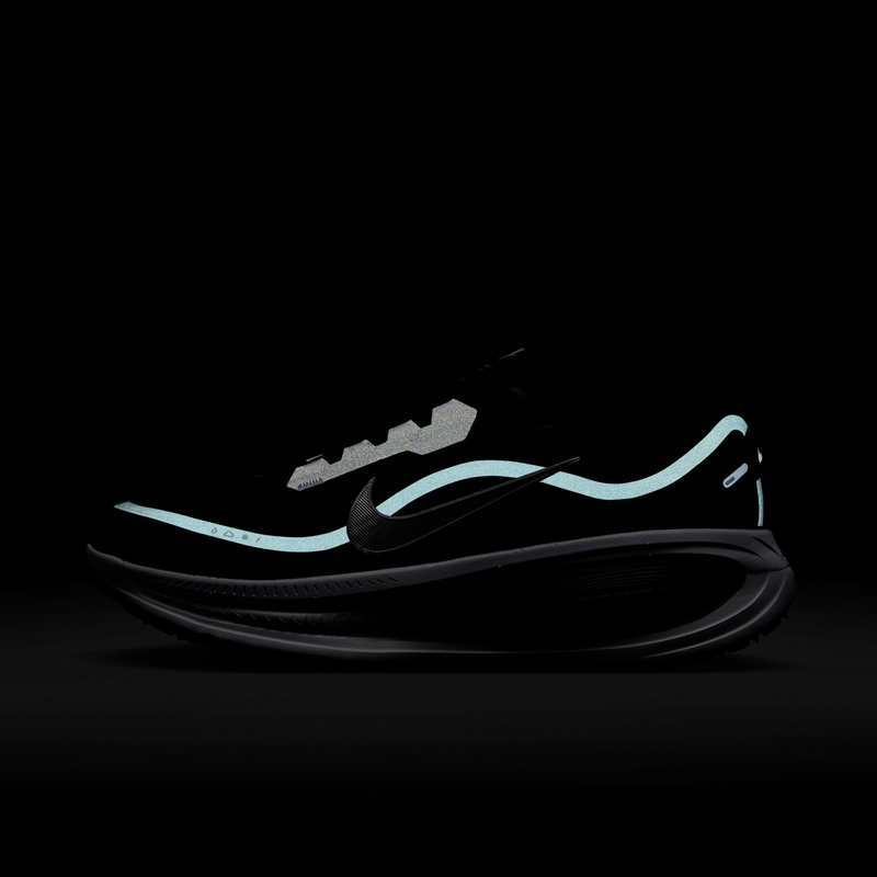Nike Vomero 18 GORE-TEX running shoes in black with reflective accents and waterproof GORE-TEX material, side view.