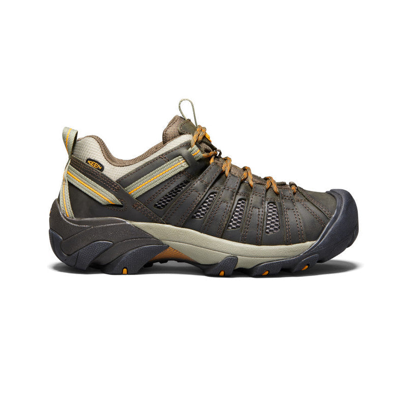 Keen Voyageur hiking shoes in brown with breathable mesh panels, durable leather overlays, and rugged outsole, side view.