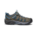 Keen Voyageur hiking shoes in brown with blue mesh panels, durable leather upper, and rugged outsole, side view.