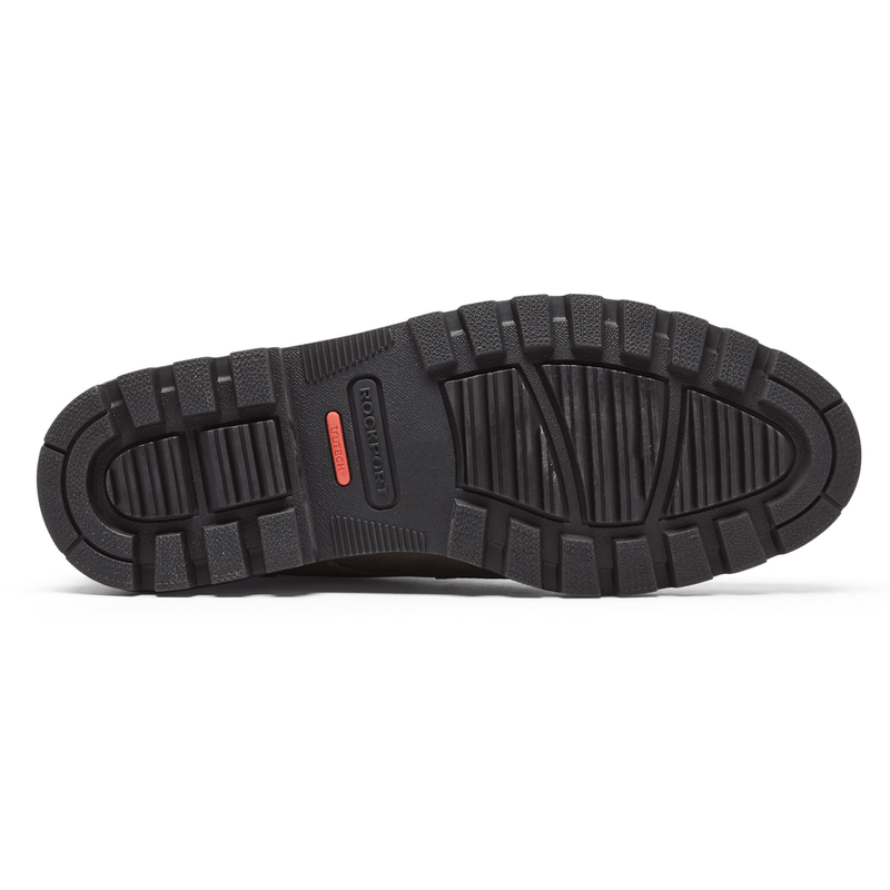 Rockport Weather or Not Waterproof Boot outsole in black rubber with deep traction grooves, bottom view.