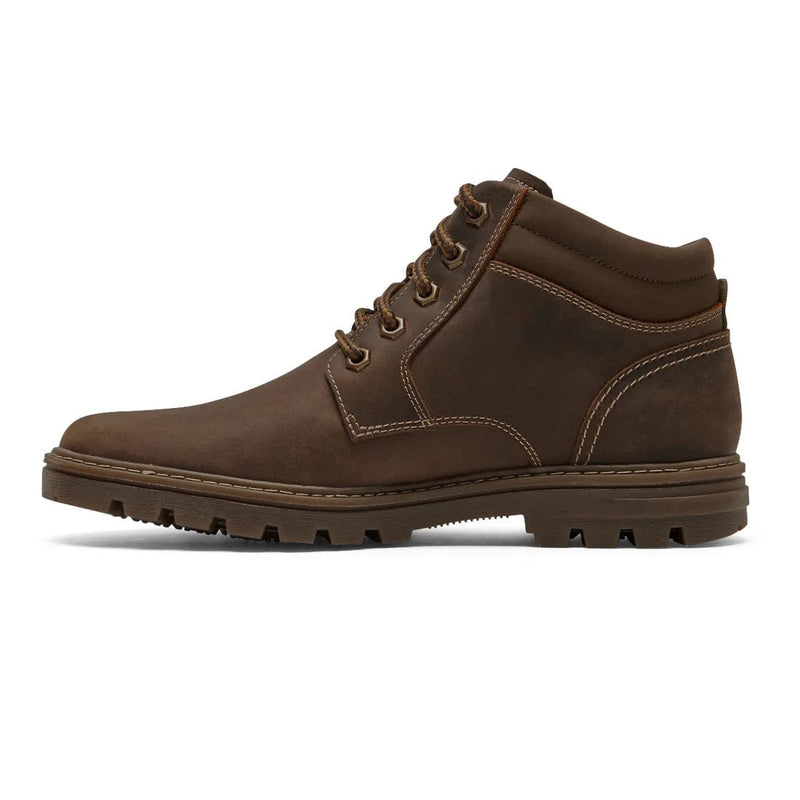 Rockport Weather or Not Waterproof Boot in brown leather with lace-up closure and stitched detailing, side view.