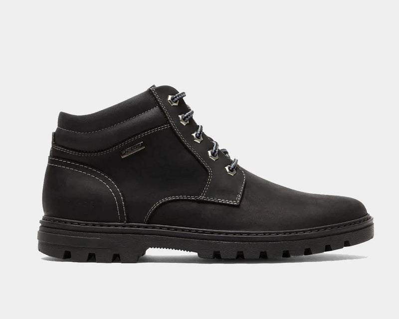 Rockport Weather or Not Waterproof Boot in black with nubuck leather upper, contrast stitching, and rugged lug sole, side view.