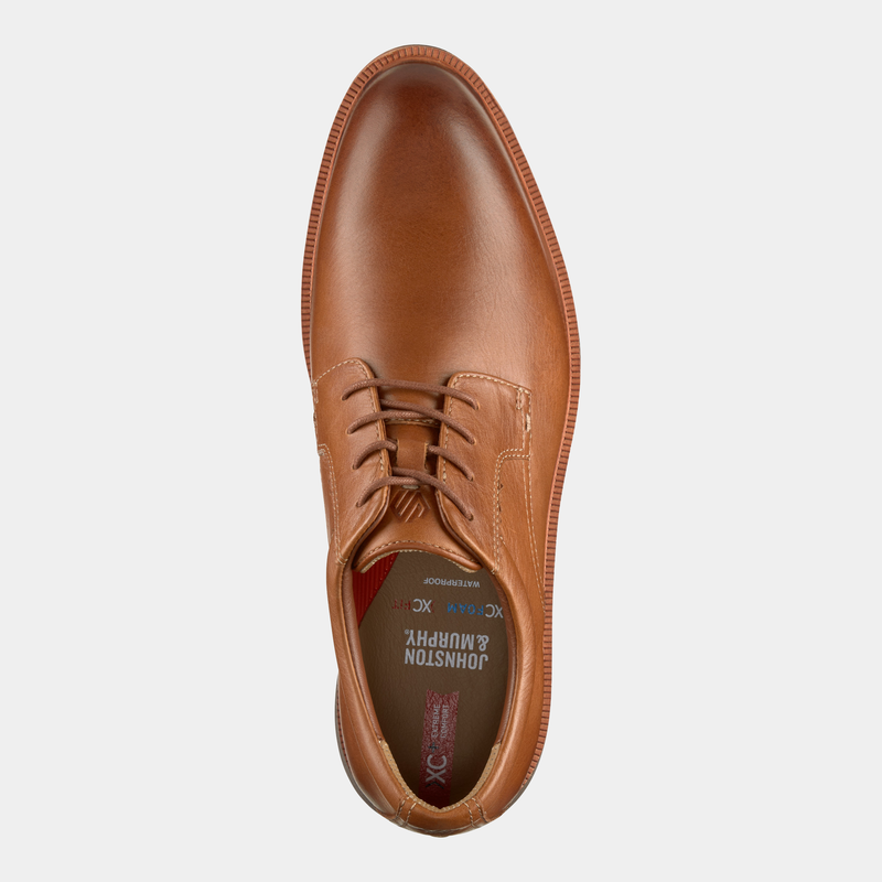 Johnston & Murphy XC+ Parker casual shoes in tan leather with lace-up design and cushioned insole, top view.
