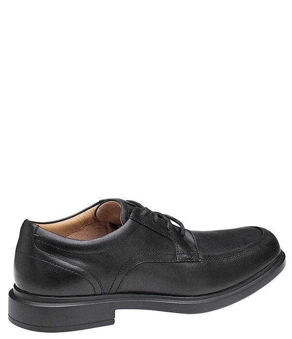 Johnston & Murphy XC4 Stanton 2.0 Waterproof Moc Toe shoes in black leather with lace-up design, side view.