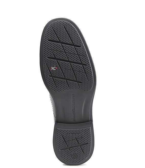 Johnston & Murphy XC4 Stanton 2.0 Waterproof Run-Off Slip-On shoe outsole showing slip-resistant tread and XC4 logo in black.